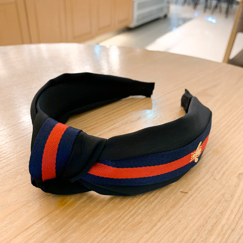 A lady bee knotted headband, Korean version, wide-sided simple headband, high cranial top stripe, wide-sided pressure headband, non-slip.