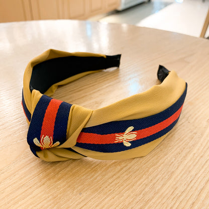 A lady bee knotted headband, Korean version, wide-sided simple headband, high cranial top stripe, wide-sided pressure headband, non-slip.