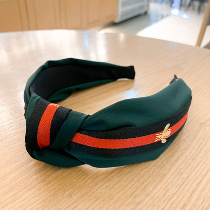 A lady bee knotted headband, Korean version, wide-sided simple headband, high cranial top stripe, wide-sided pressure headband, non-slip.