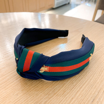 A lady bee knotted headband, Korean version, wide-sided simple headband, high cranial top stripe, wide-sided pressure headband, non-slip.