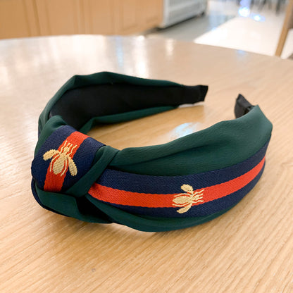 A lady bee knotted headband, Korean version, wide-sided simple headband, high cranial top stripe, wide-sided pressure headband, non-slip.