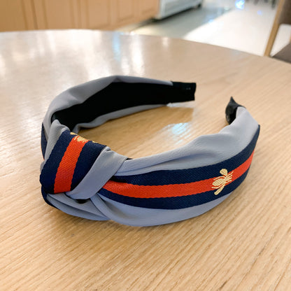 A lady bee knotted headband, Korean version, wide-sided simple headband, high cranial top stripe, wide-sided pressure headband, non-slip.