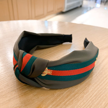 A lady bee knotted headband, Korean version, wide-sided simple headband, high cranial top stripe, wide-sided pressure headband, non-slip.
