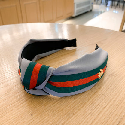A lady bee knotted headband, Korean version, wide-sided simple headband, high cranial top stripe, wide-sided pressure headband, non-slip.