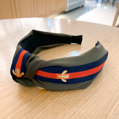 A lady bee knotted headband, Korean version, wide-sided simple headband, high cranial top stripe, wide-sided pressure headband, non-slip.