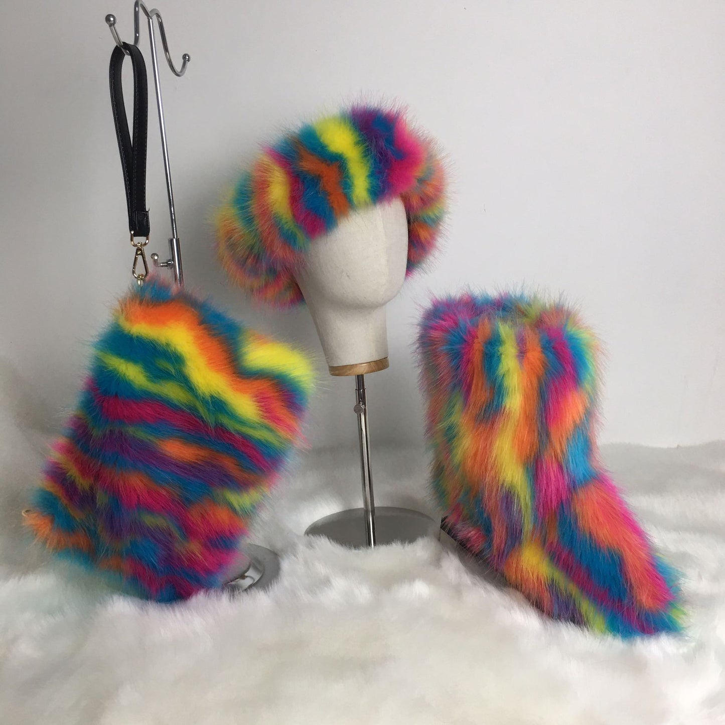 A women's fluffy snow boots clutch bag plush headband headgear three 3-piece set