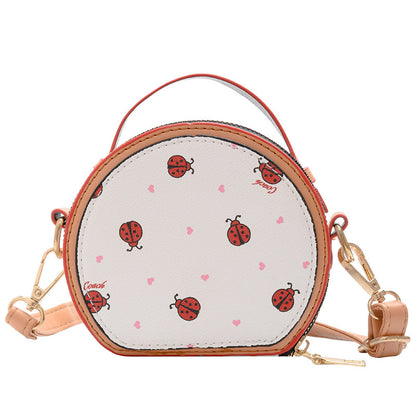 A European and American trend children's bag personalized letters niche Internet celebrity girl hand carry messenger bag baby accessories round bag