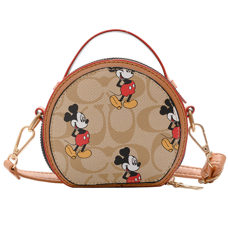 A European and American trend children's bag personalized letters niche Internet celebrity girl hand carry messenger bag baby accessories round bag