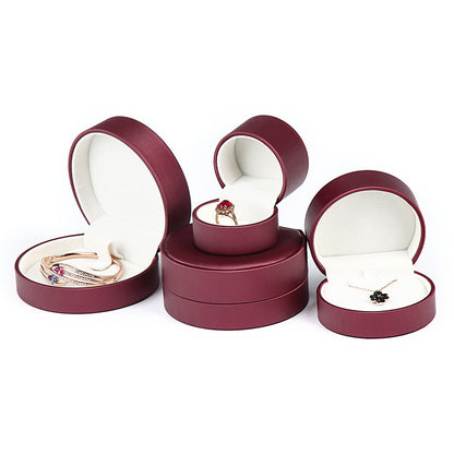 A rounded brushed leather jewelry box
