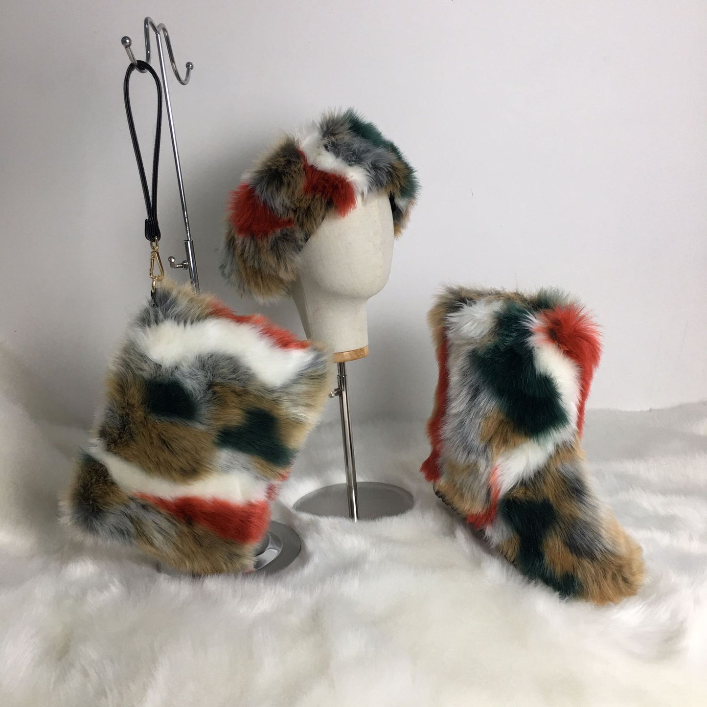A women's fluffy snow boots clutch bag plush headband headgear three 3-piece set