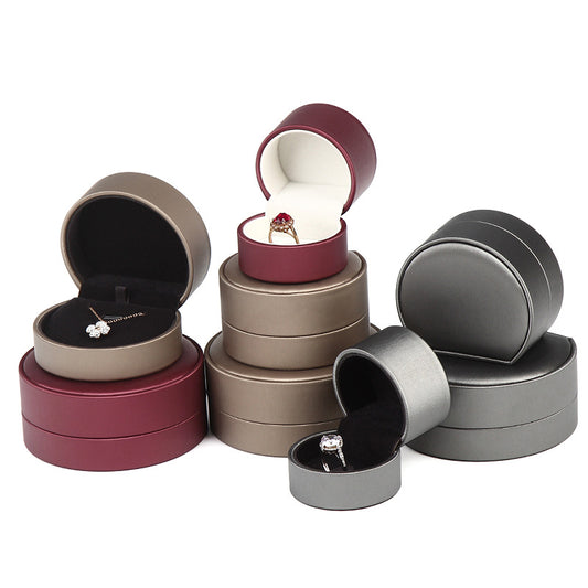 A rounded brushed leather jewelry box