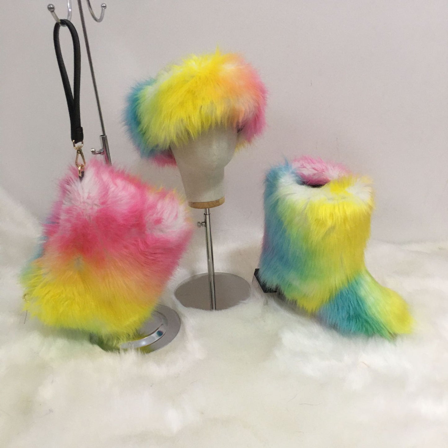 A women's fluffy snow boots clutch bag plush headband headgear three 3-piece set
