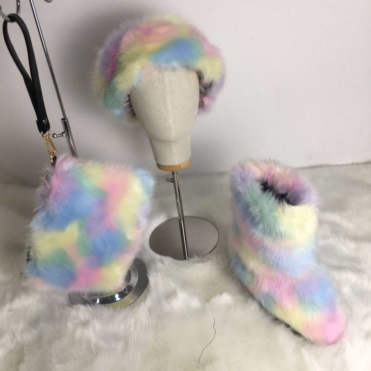 A women's fluffy snow boots clutch bag plush headband headgear three 3-piece set