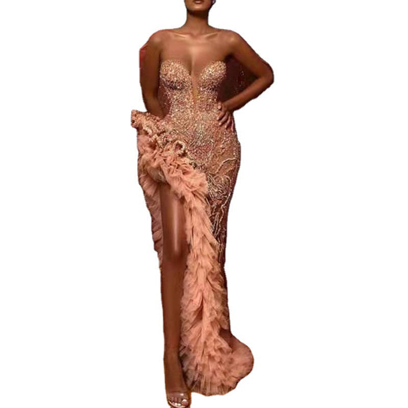 A summer new European and American women's clothing Amazon dress fringed tail sexy gold tube top evening dress