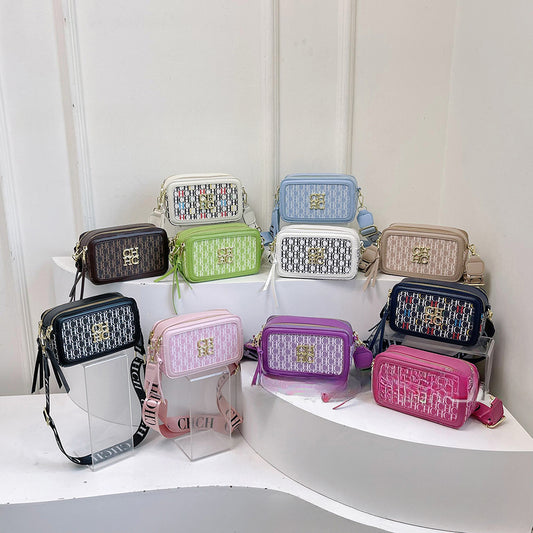 A Europe and the United States new personality letter style color fashion popular letter solid color shoulder messenger bag tide