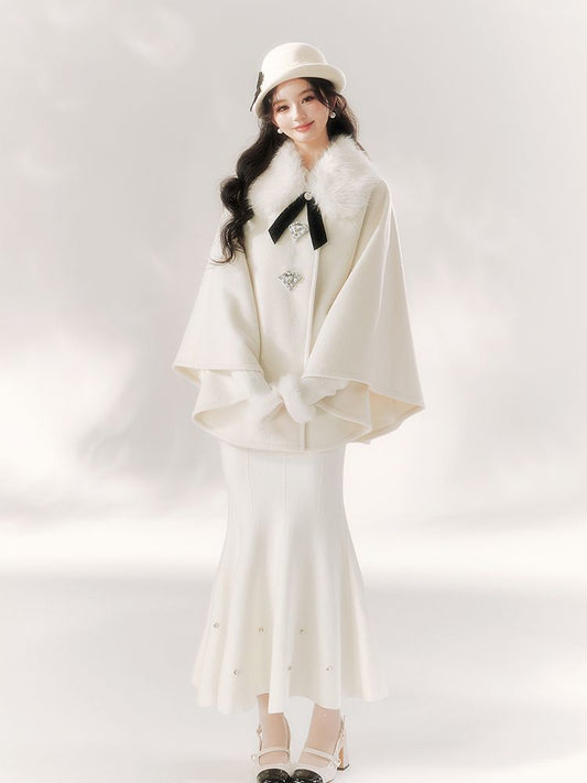 A Cape Coat and Skirt Set