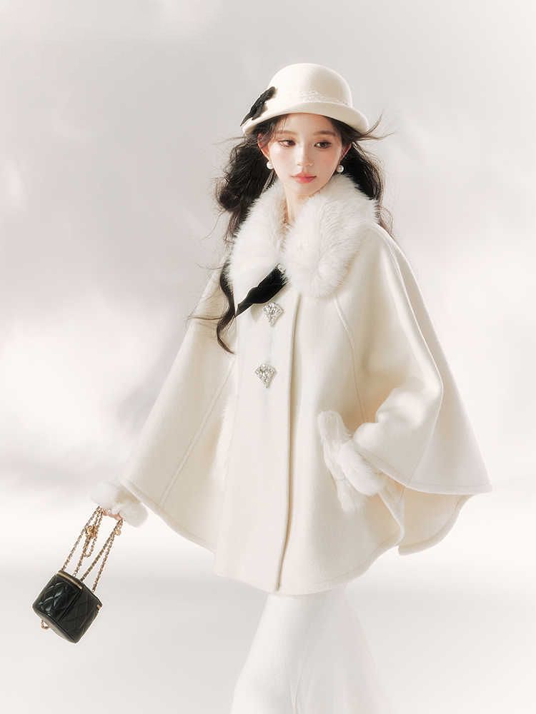 A Cape Coat and Skirt Set