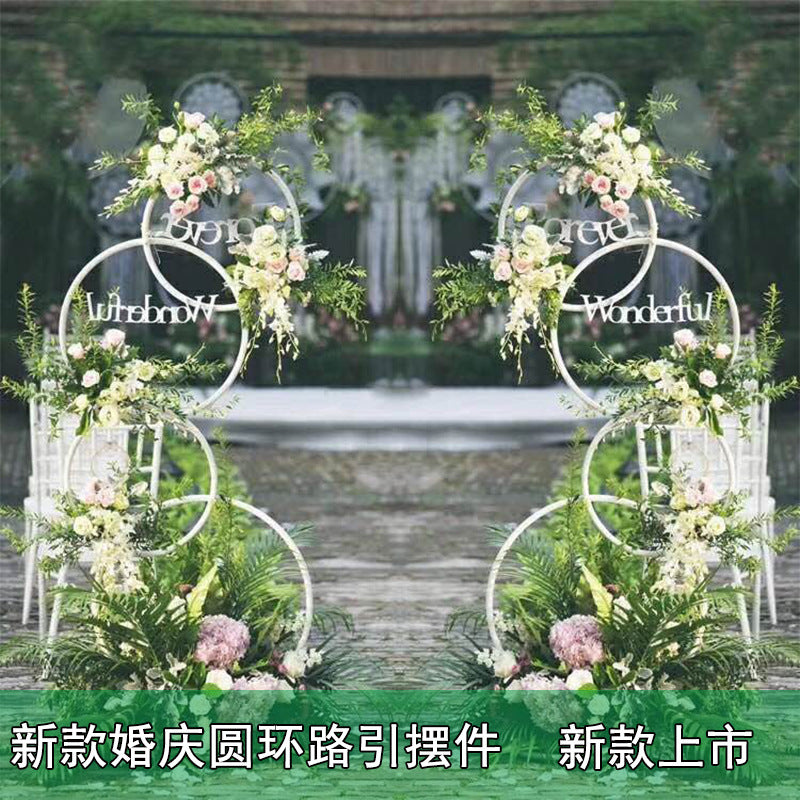 A wrought iron flower stand road guide