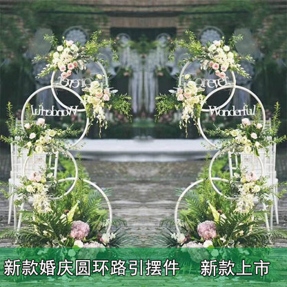 A wrought iron flower stand road guide
