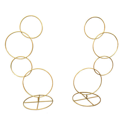 A wrought iron flower stand road guide