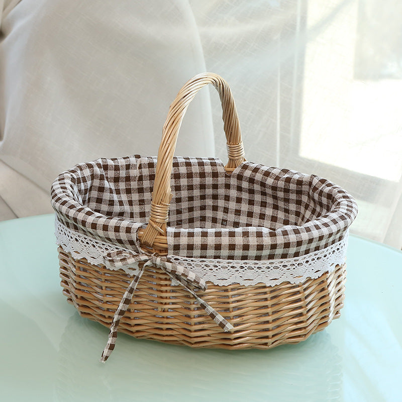 A Portable rattan storage basket Outdoor willow picnic basket Sundries storage ins Wind gift basket Rattan woven basket