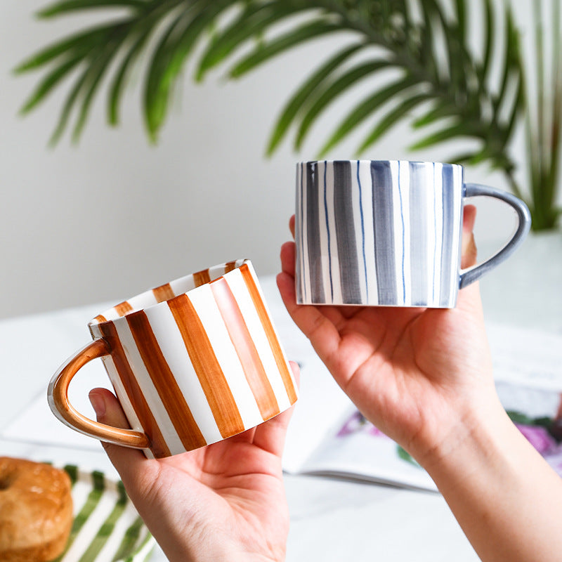 A ceramic coffee cup and saucer set