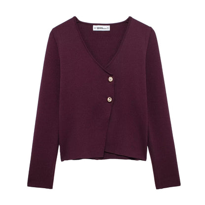A button-down long-sleeved knit top
