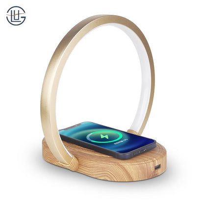 A Mobile phone wireless charging LED desk lamp