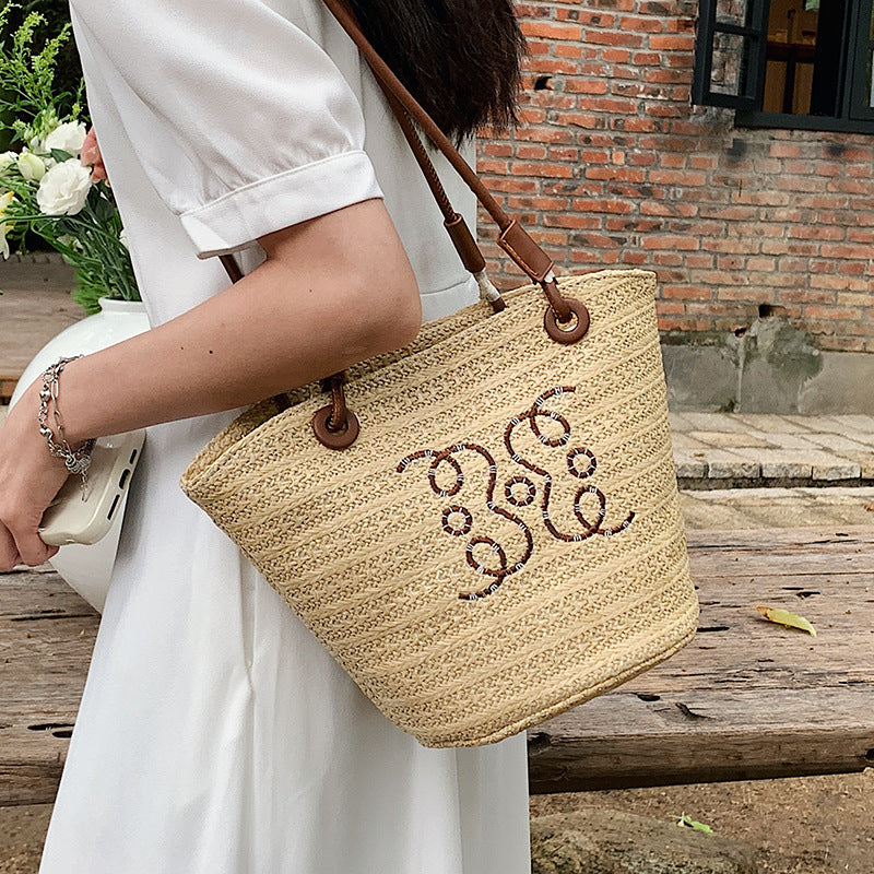 A straw bag shoulder bag