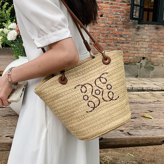 A straw bag shoulder bag