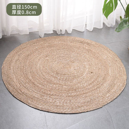 A handmade grass rattan woven carpet floor mat
