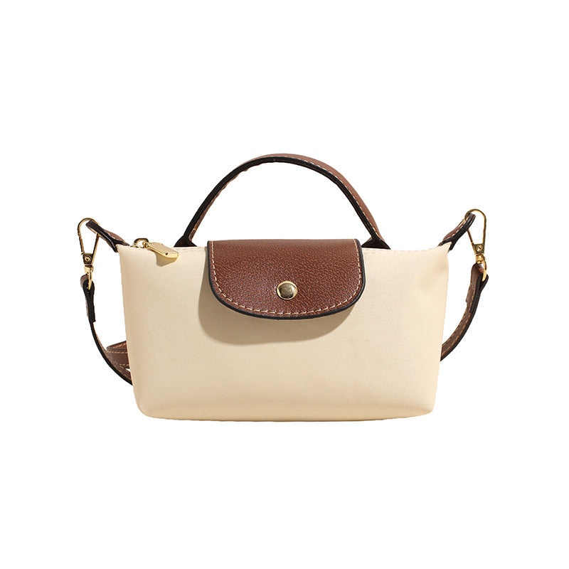 A new Oxford cloth women's bag fashion splicing dumpling bag simple handbag premium texture commuter bag