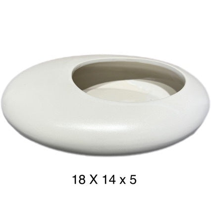 A ceramic flower pot potting container