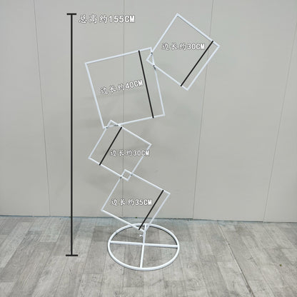 A wrought iron flower stand road guide