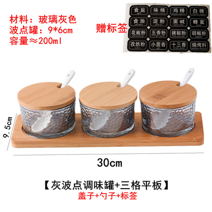 A kitchen seasoning box bamboo cover glass jar