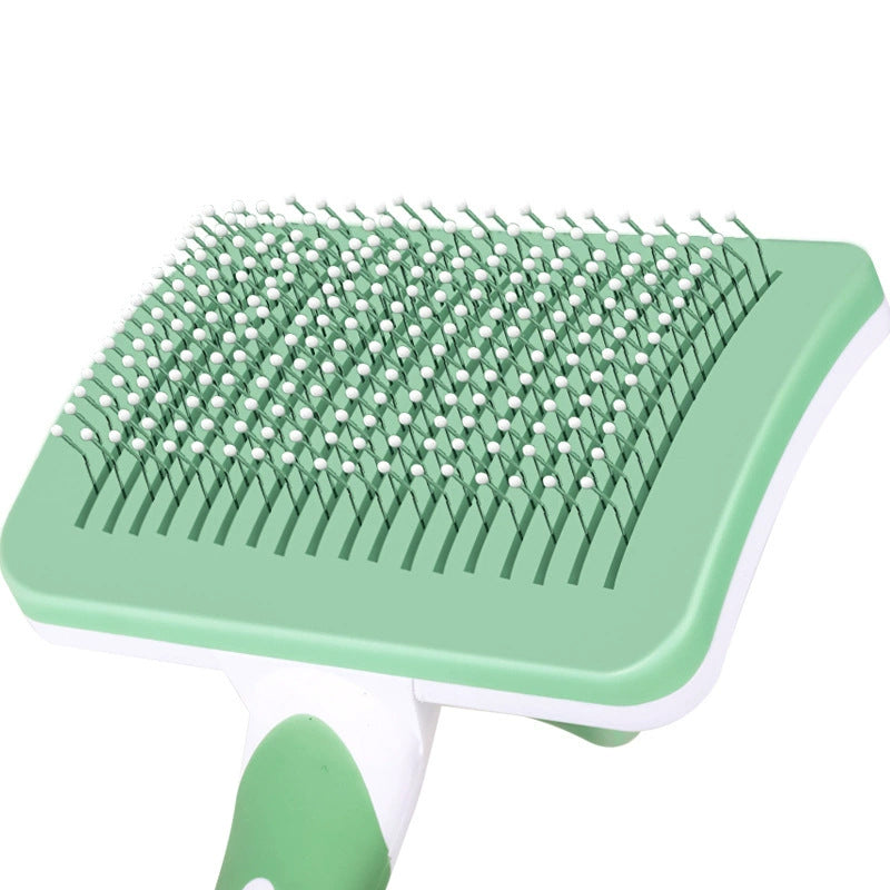 A pet comb needle hair combing tool