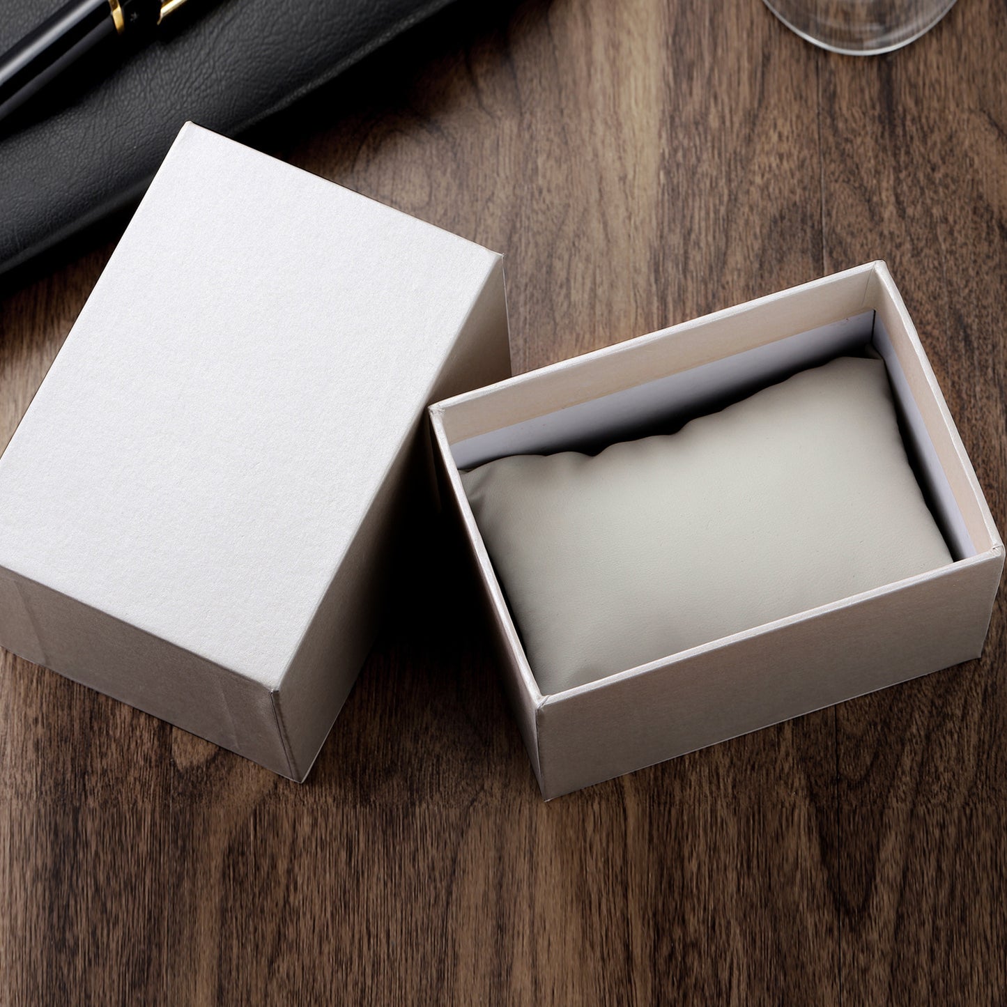 A product packaging box, white cardboard watch box.
