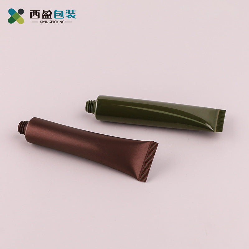 A 20g brown eye cream tube with plastic black cover pickle green facial cleanser hose, cosmetic plastic packaging bottle - Mixbatch