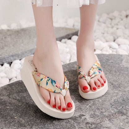 A Internet celebrity new women's cool slippers small height increase non-slip clip foot flip-flop slope bottom student cool summer