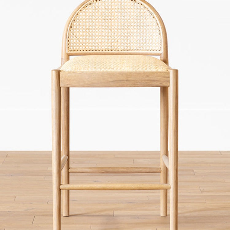 A solid wood rattan chair