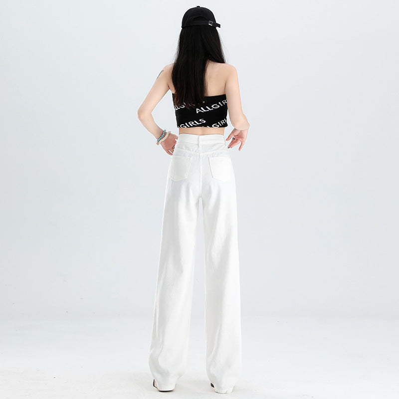 A pair of ripped white jeans
