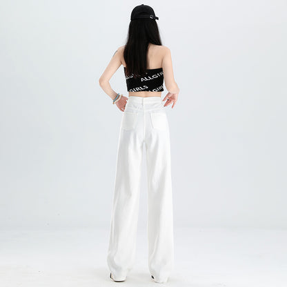 A pair of ripped white jeans