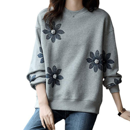 A flower beaded sweater