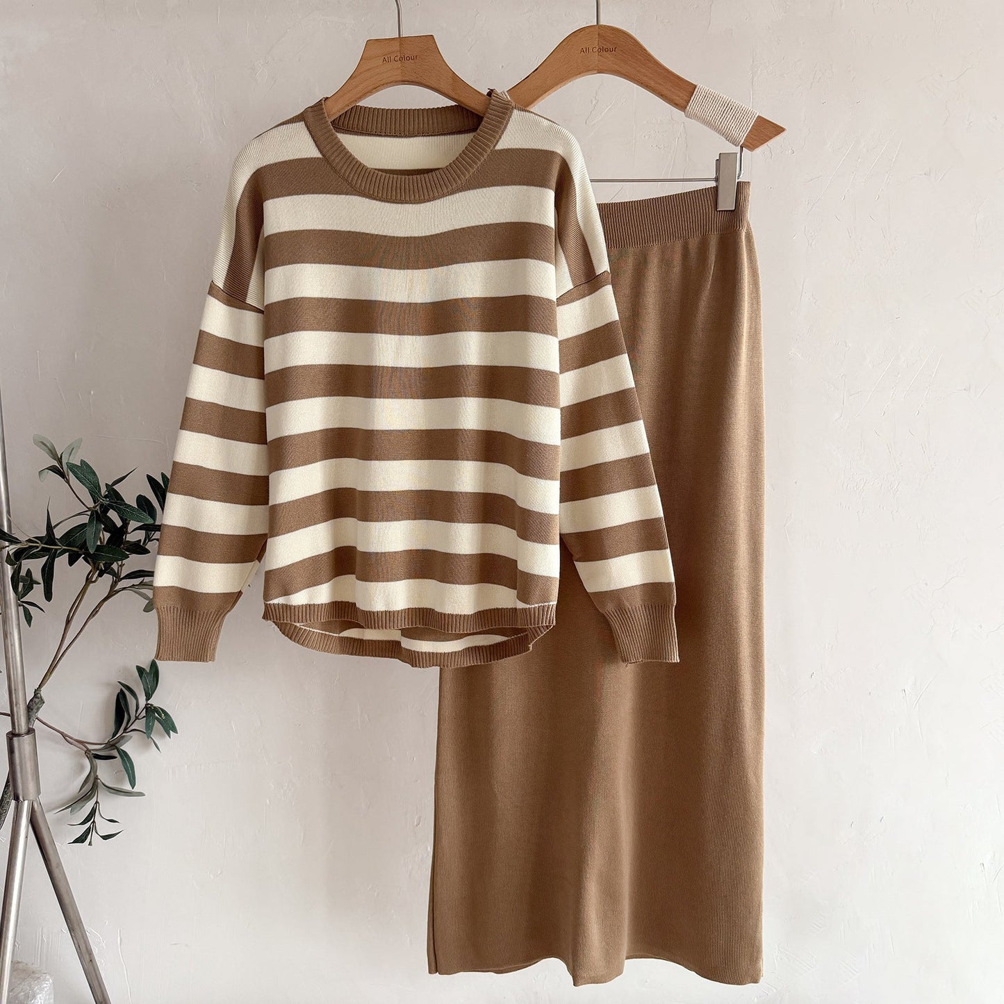 A Knitted long-sleeved top skirt two-piece set