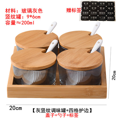 A kitchen seasoning box bamboo cover glass jar