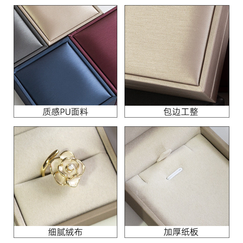 A brushed PU leather bronzing LOGO jewelry box