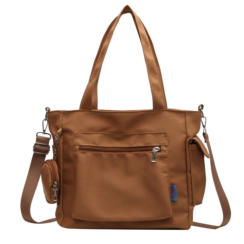A new solid color canvas bag women's large-capacity shoulder bag student versatile tote bag hand bag messenger cloth bag