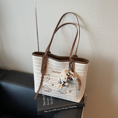 A straw bag shoulder bag