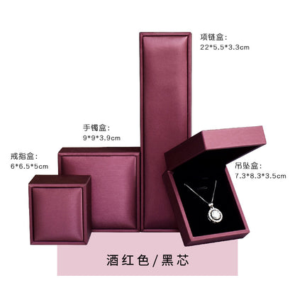 A brushed PU leather bronzing LOGO jewelry box
