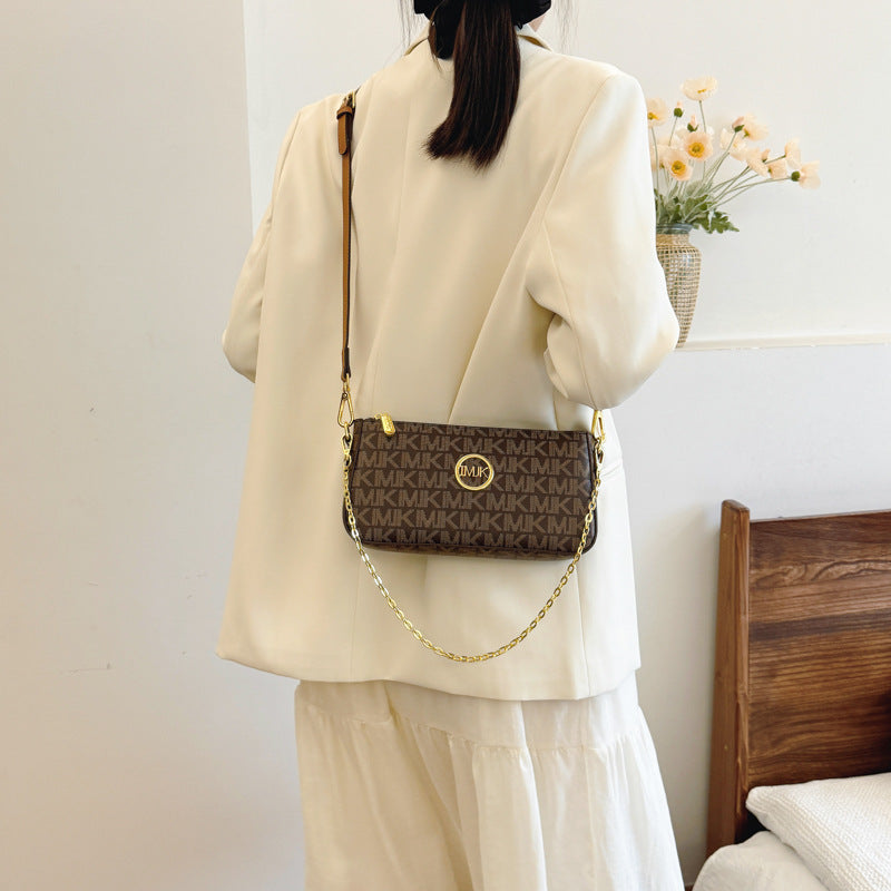 A new fashionable versatile women's bag shoulder messenger bag retro printed chain small square bag women